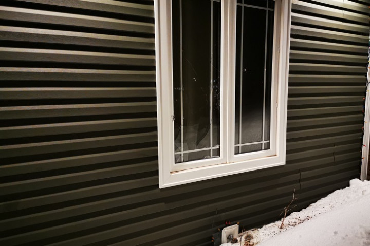 Happy Valley-Goose Bay RCMP investigate a broken window at a residence on McLean Cresent on March 25, 2020.
