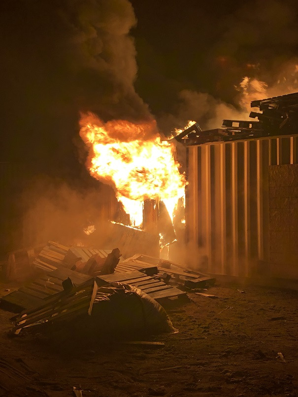 Two sea cans (shipping containers), owned by Dobson Construction, containing property valued at more than $50,000, were set fire on July 23, 2020. 