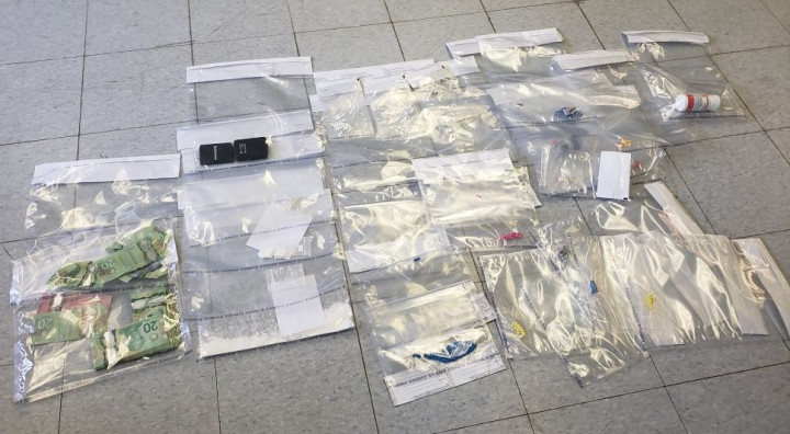 A quantity of cocaine, prescription pills, cash and other items consistent with drug-trafficking were seized following the execution of a search warrant on a Western Bay home on June 4, 2021.
