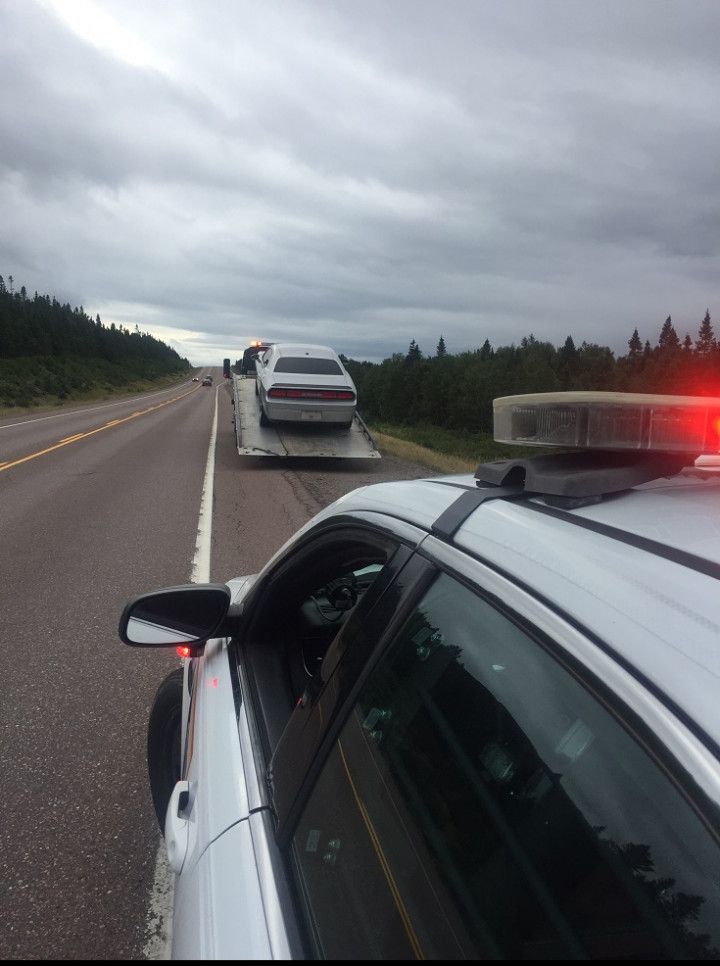 This grey Dodge car was seized and impounded by RCMP Traffic Services West on September 6, 2021, having tires not fit for the road.