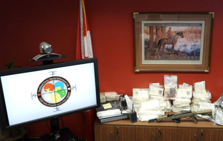 Display of items such as drugs, cash, and firearms that were seized as a result of the CFSEU investigation.