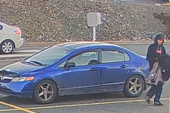 RCMP NL looks to identify these two individuals, who departed Orange Stores in Holyrood and on the TCH near Goobies, without paying for merchandise, in this blue Honda Civic.