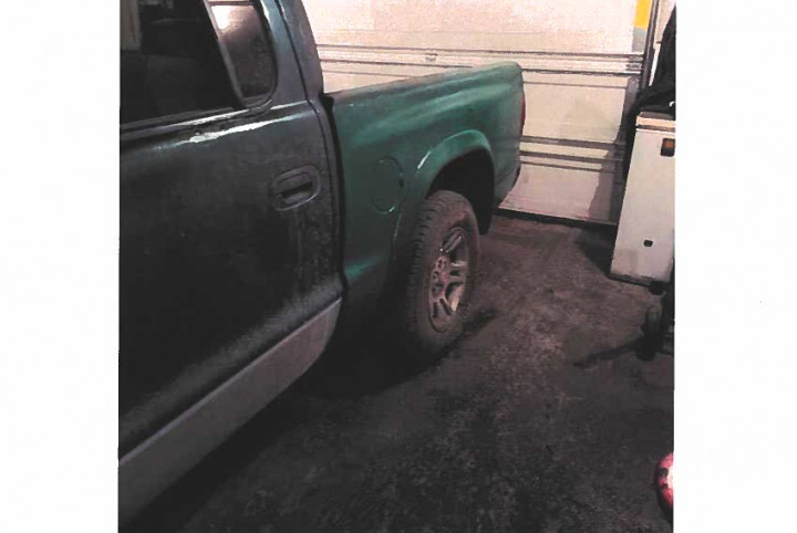 The stolen Dodge Dakota truck is two shades of green, a darker green in the front and a lighter green along the rear side panels and tail gate.