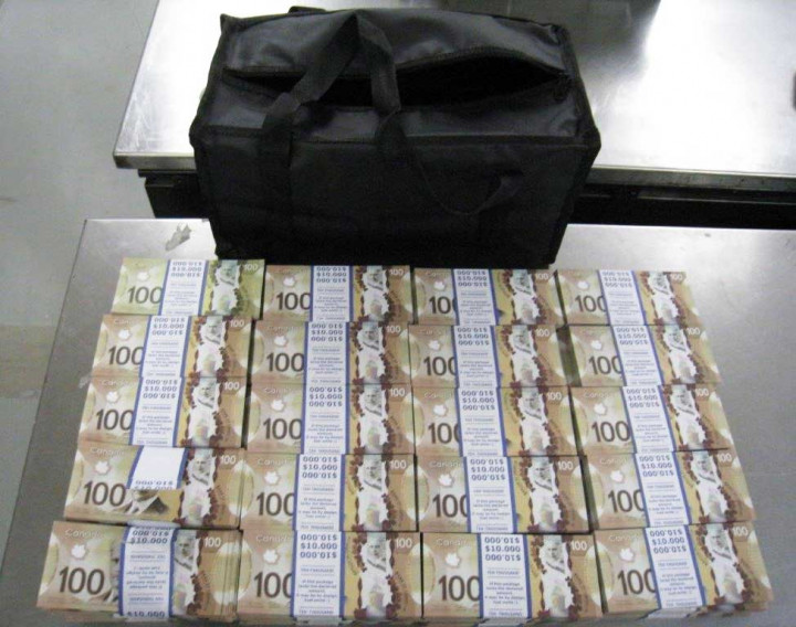 Wads of counterfeit Can$100 bank notes totalling $1 million were seized.