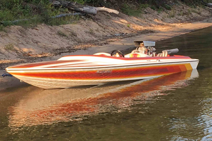 The rare motorboat is described as an orange 1984 Targa with a red trailer, serial number NS0F0020M840. 