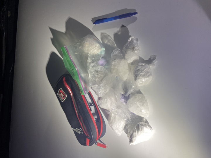 Assorted packages of suspected illicit drugs, including fentanyl, methamphetamine, cocaine and MDMA.