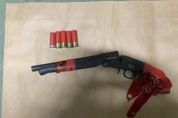 A loaded sawed-off shot gun