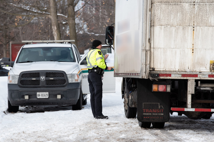 RCMP officer talking to a commercial vehicle driver