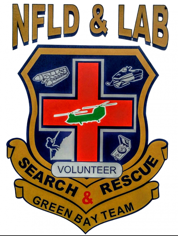 L'écusson de Green Bay Search and Rescue avec les mots : NFLD & Lab, Volunteer, Search and Rescue, Green Bay Team.