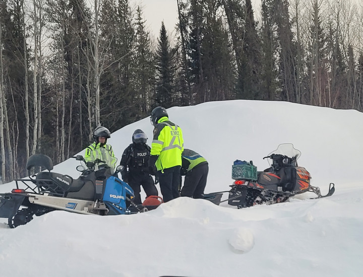 RCMP, EMS and community members working together to help male in distress