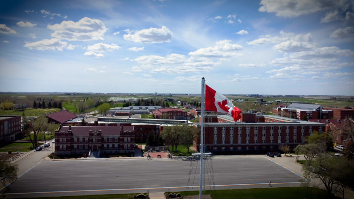 Depot's Canadian flag can be seen with a view of Parade Square and brick buildings in the background.
