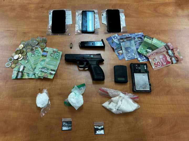 Seized a loaded handgun, a quantity of ammunition, approximately 172 grams of crack cocaine, a sum of cash, and other drug paraphernalia. 
