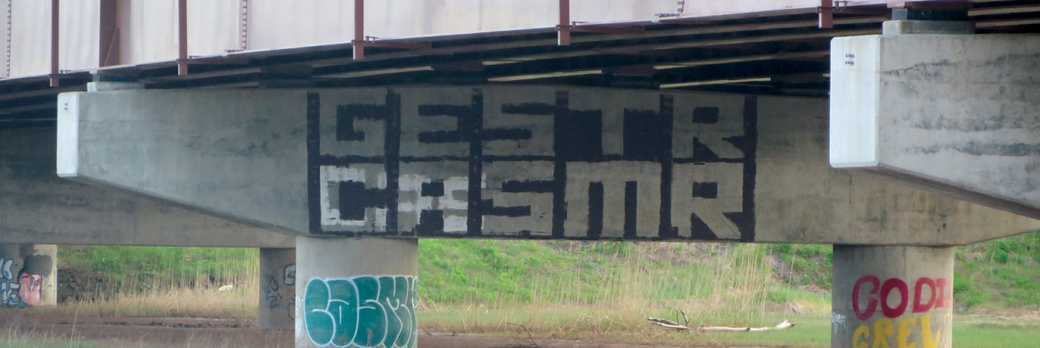 Graffiti on highway underpass.