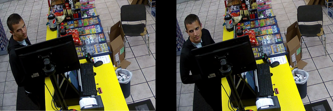 Man stands at store checkout counter.